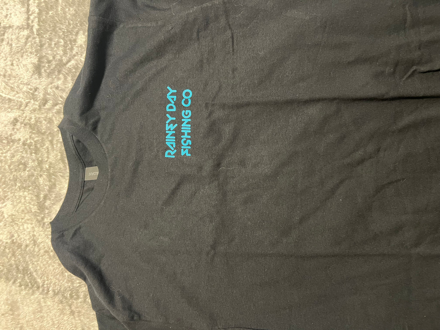 Medium Short sleeve black shirt teal writing