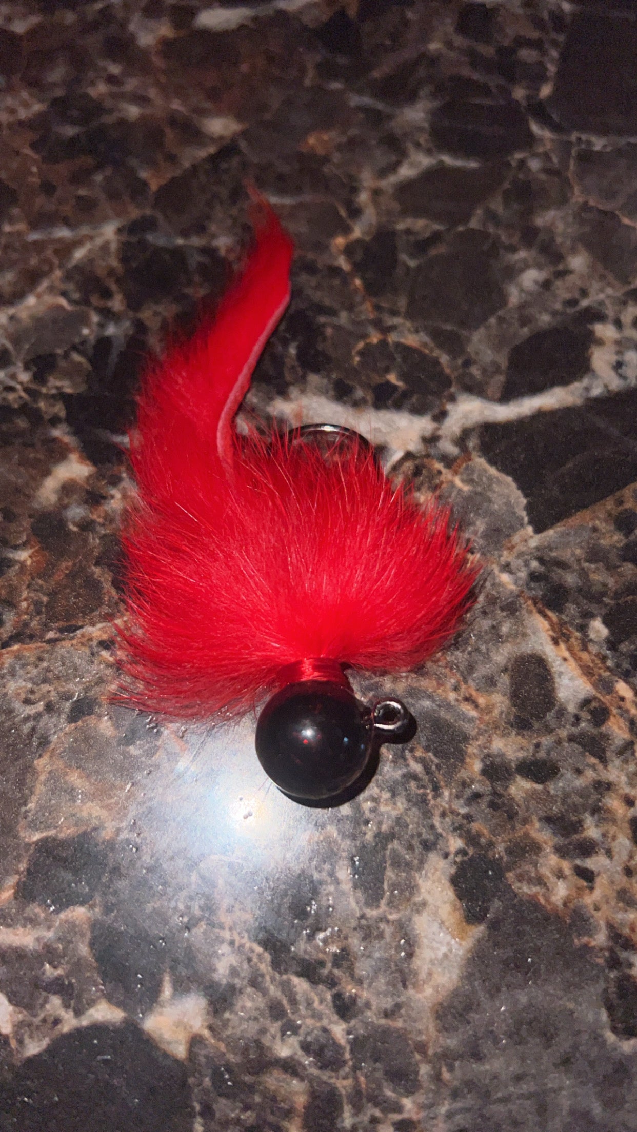 1/2 oz jig black head red body